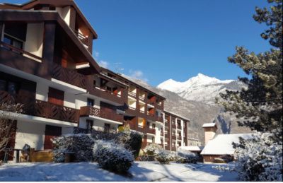 outside view of apartment block in snow