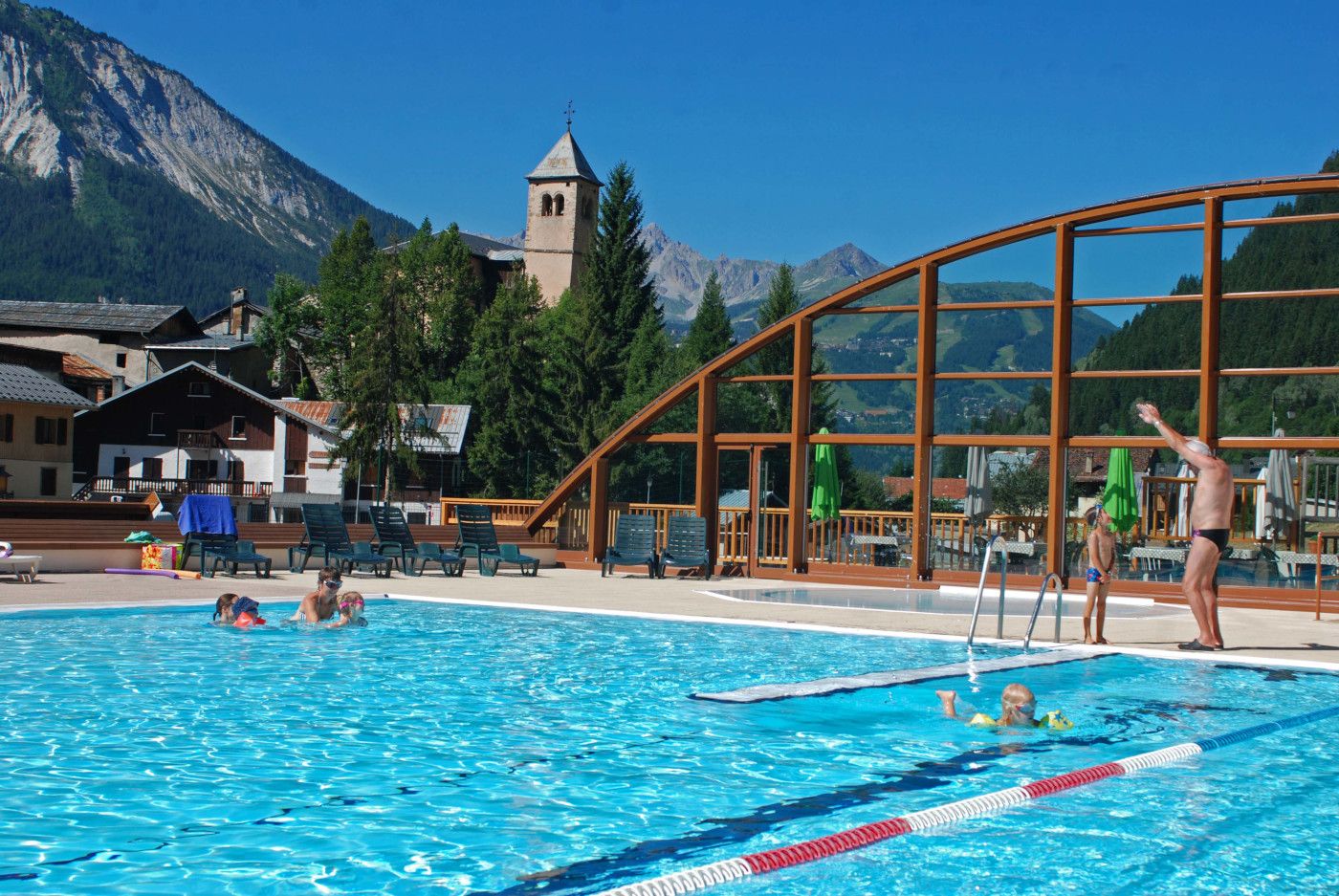 Champagny swimming pool in summer with roof open